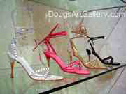 Shoe art of four ankle strap high heels in assorted colors